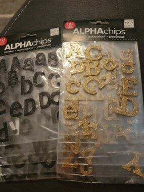 Alpha chips alphabet stockers. Gold and black